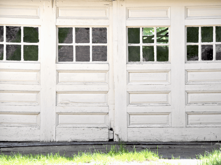 reasons to replace an old garage door