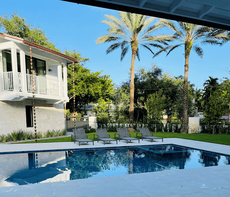 backyard pool of custom home in south florida