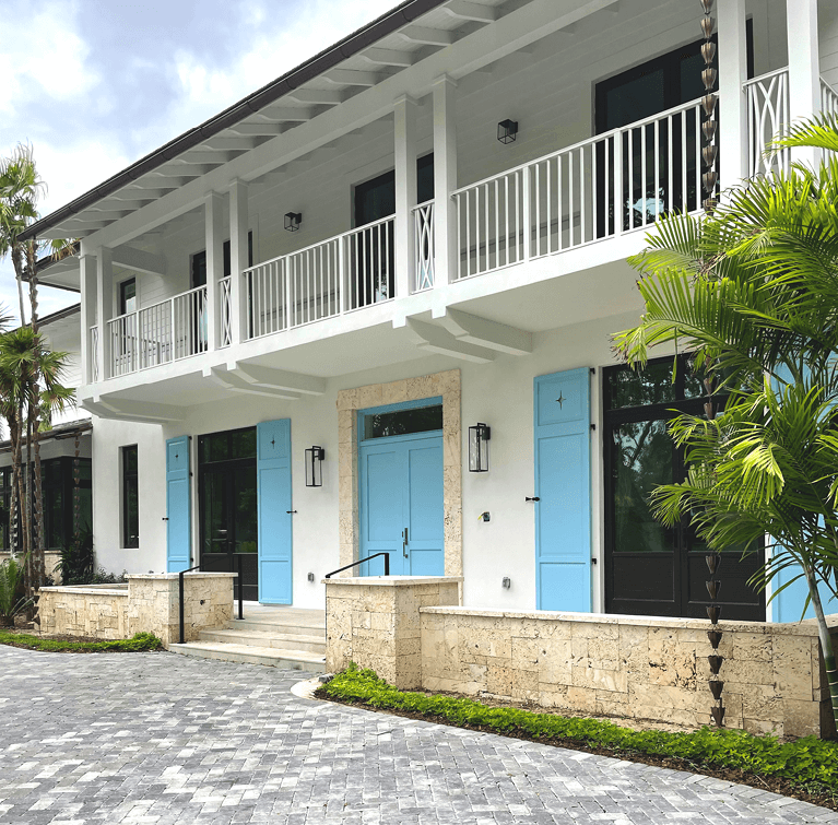 south florida custom home with Timberlane exterior shutters