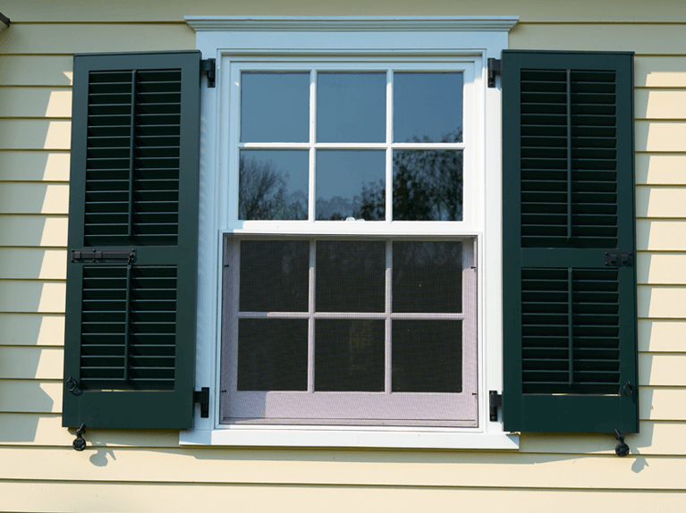 custom louver exterior shutters with functional hardware 