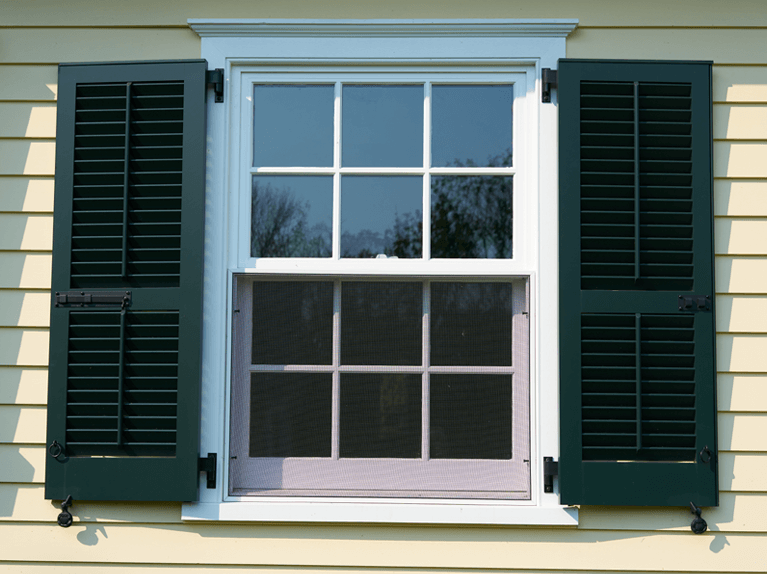 operable louver shutters installed with functional hardware