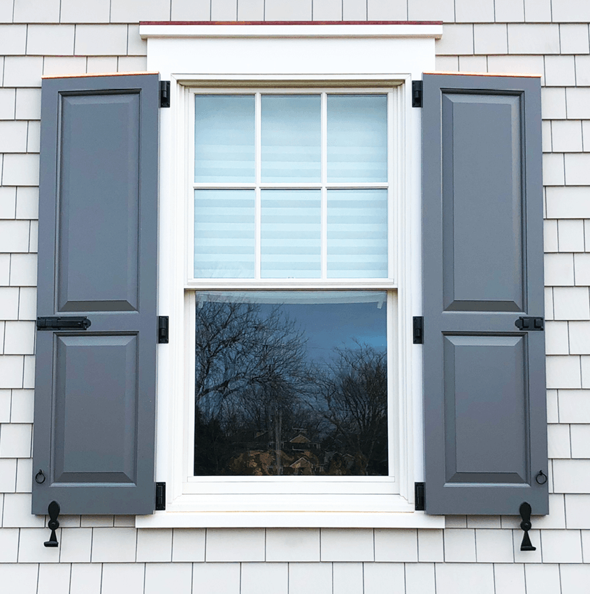 panel shutters installed with functional hardware and copper capping