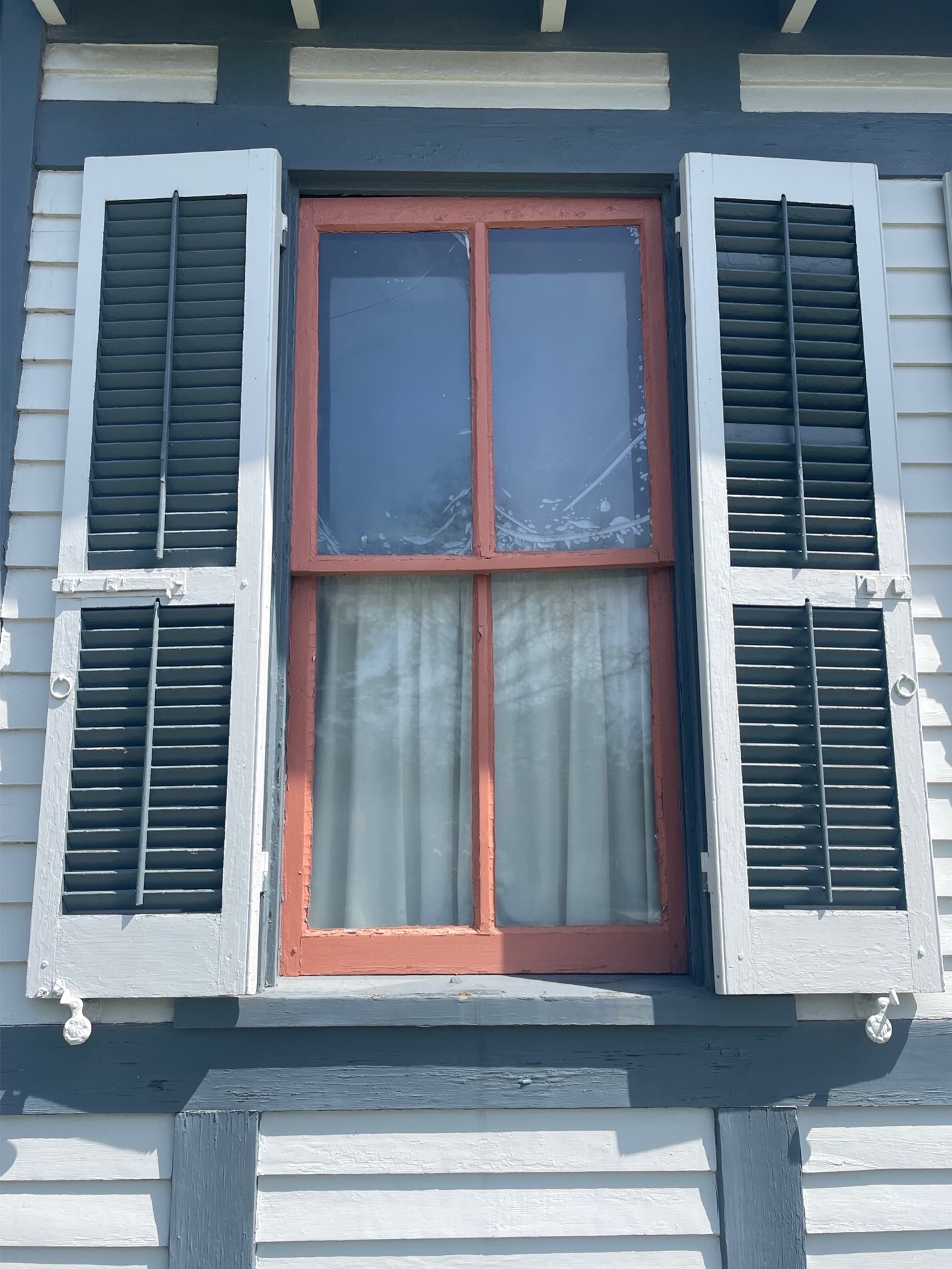 Historic Louvered shutters on a seacoast house
