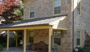 image of STONE home BEFORE SHUTTERS