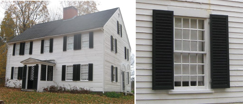 full photo and close up of black louver shutters on white vinyl siding home