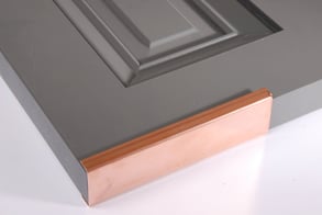 Copper shutter capping on gray panel shutter