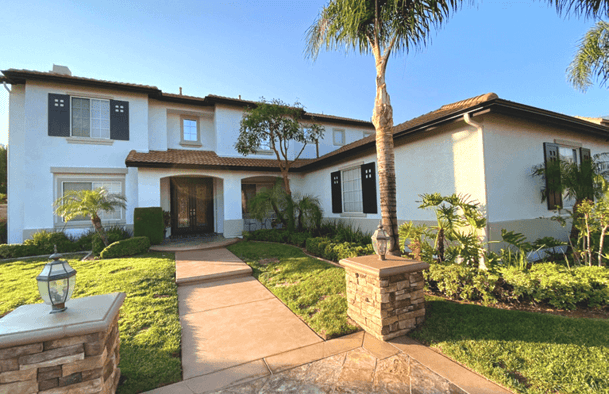 black-fixed-mount-mission-shutters-white-stucco-house