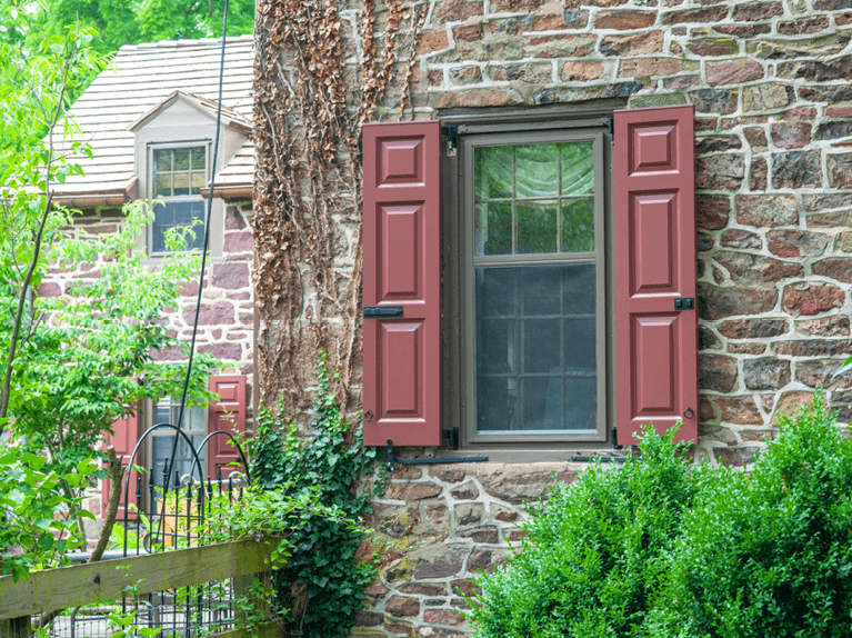 perfectly proportionate Timberlane shutter featured raised panels, shutter hinges, shutter locks and shutter tiebacks