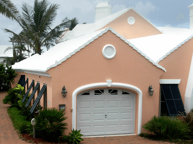 how to style a stucco home with black bermuda shutters