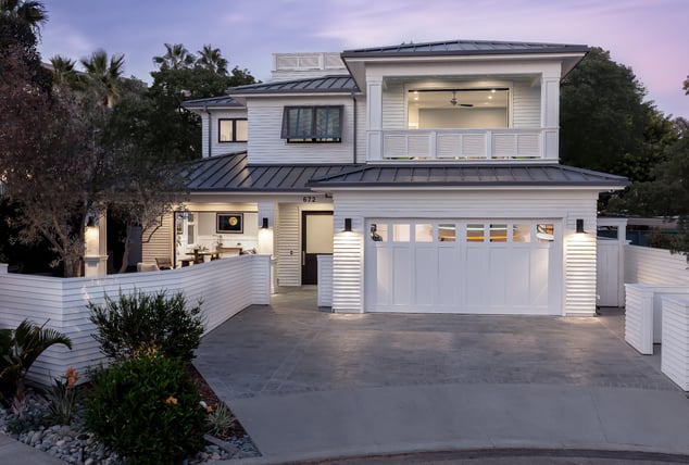 White bermuda shutter railing on white siding house front