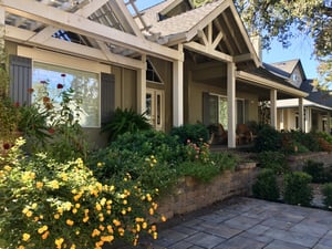 Beautiful Exterior board and batten shutters on front of house