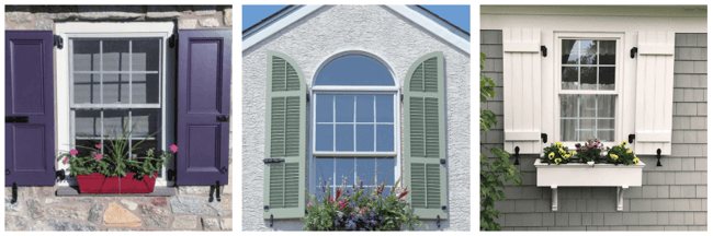 window boxes with purple, green and white shutters